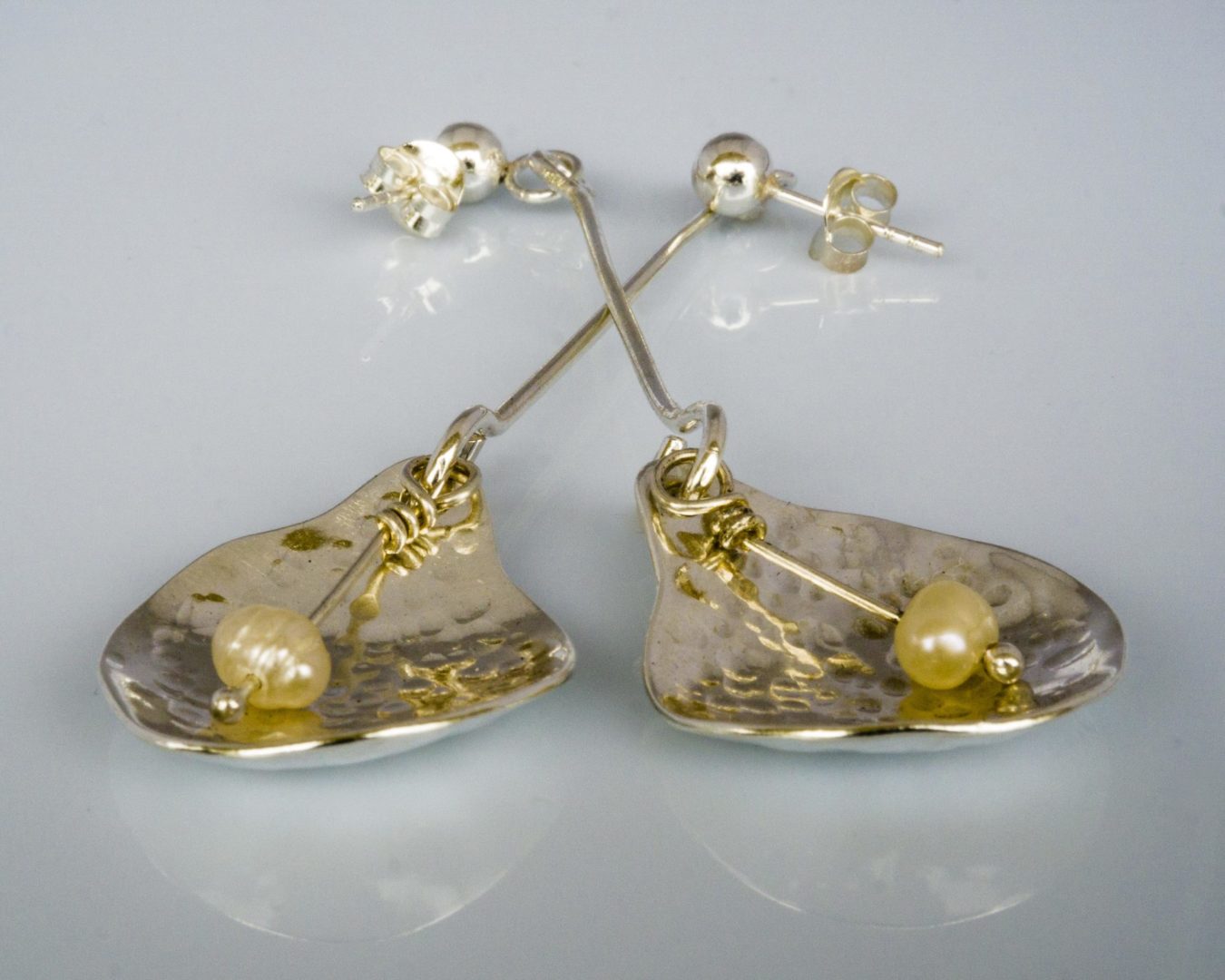 Pendientes Labrados con Perla de Río. Pendientes Labrados con Perla de Río.
